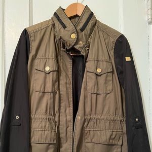 Used Vince Camuto jacket, no wear and tear. Had hood good for spring or fall